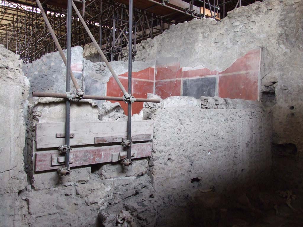IX.12.8 Pompeii. December 2006. West wall of stable “n”, with view across stable to triclinium “m” of IX.12.6.
