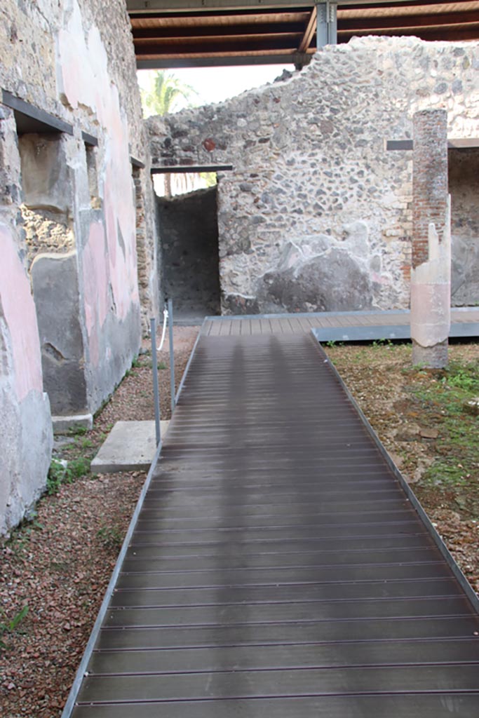 HGW24 Pompeii. Villa of Diomedes. October 2023.
Looking west along south portico, with doorway into antechamber, on left. Photo courtesy of Klaus Heese.