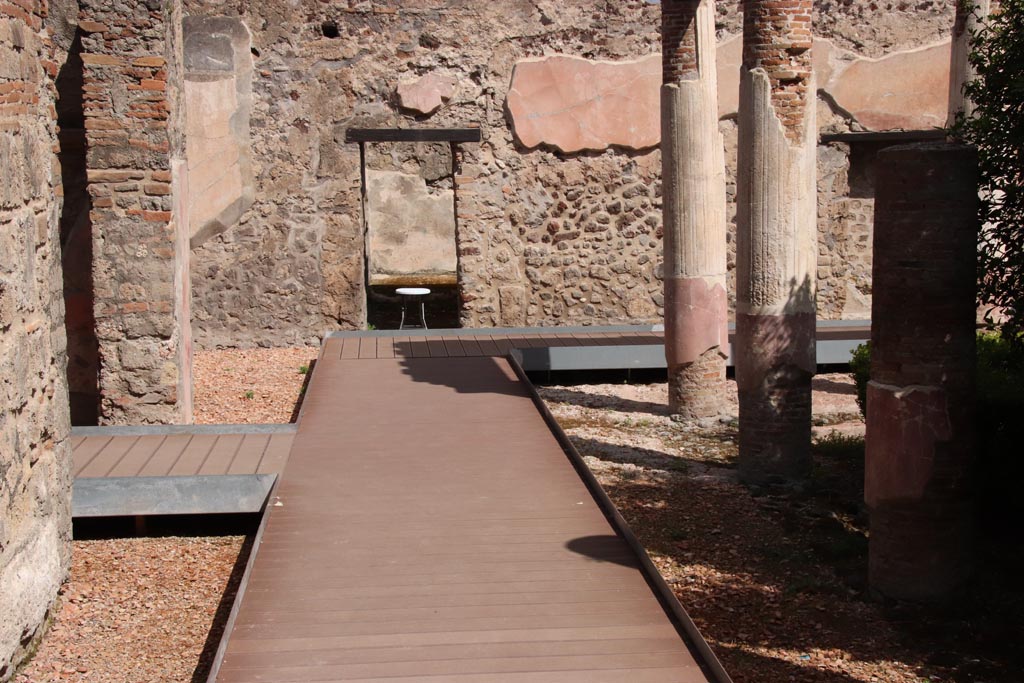 HGW24 Pompeii. Villa of Diomedes. May 2024.
Looking towards north wall of ala, on left, and doorway to room in north-west corner of peristyle, on right. Photo courtesy of Klaus Heese.