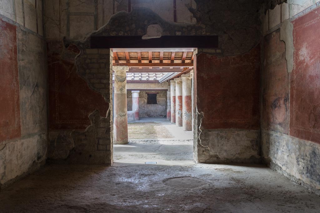 Villa Regina, Boscoreale. October 2021.
Triclinium IV, looking towards south wall with doorway to portico VII. Photo courtesy of Johannes Eber.