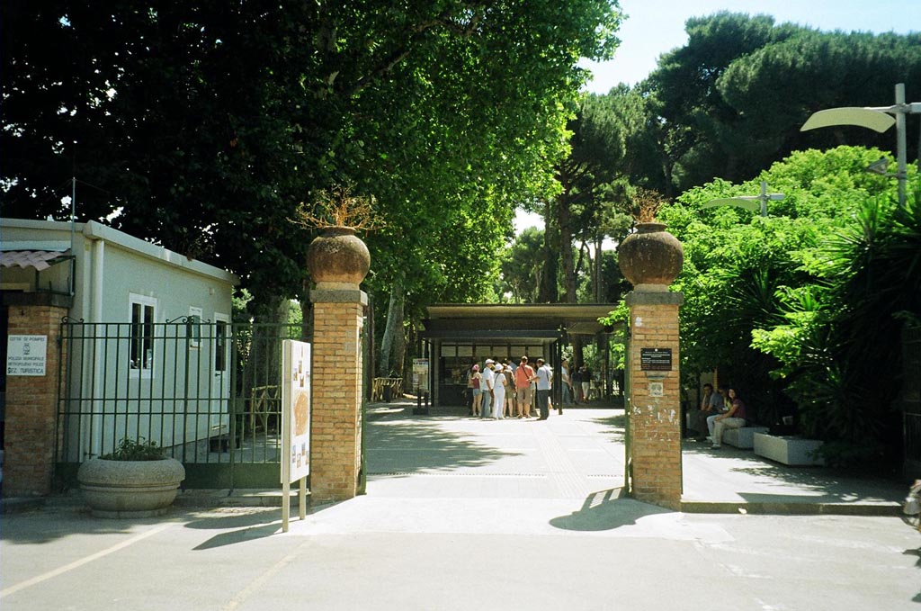 Piazza Porta Marina Inferiore. June 2010. Entrance through south side of VIII.7.16 The Gladiators Barracks. Photo courtesy of Rick Bauer.