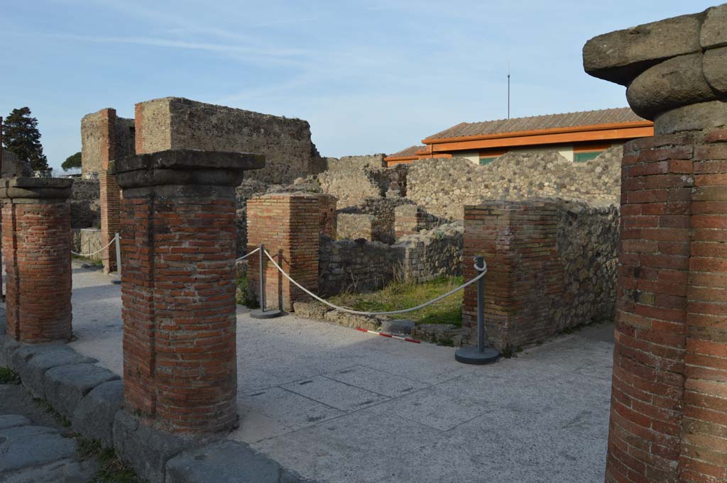 Via del Foro, east side, Pompeii. March 2019. 
Looking north-east from fourth pilaster/column, on right, towards VII.4.7, and fifth and sixth pilaster/columns. 
Foto Taylor Lauritsen, ERC Grant 681269 D�COR.
