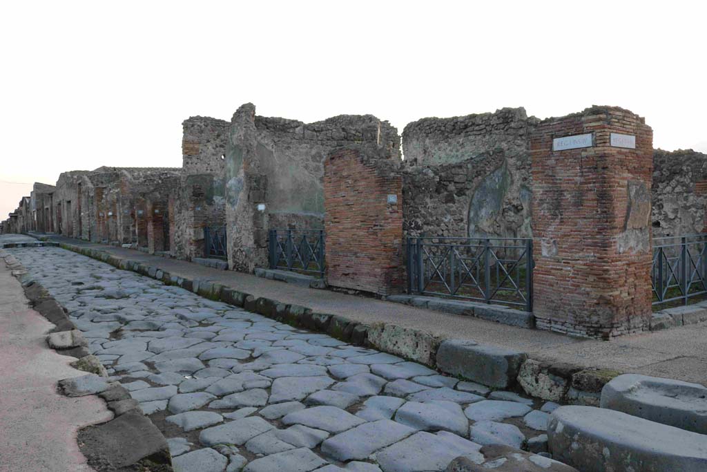 Via dell’Abbondanza. December 2018. Looking east along south side (Insula 4 or Reg. I) from junction with Via Stabiana. Photo courtesy of Aude Durand.