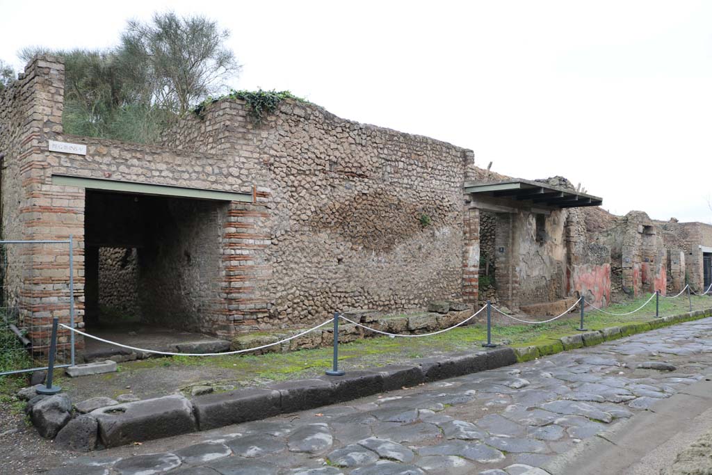 Via dell’Abbondanza, north side. December 2018. 
Looking east along insula III.5, from III.5.1 towards III.5.5, on right. Photo courtesy of Aude Durand.
