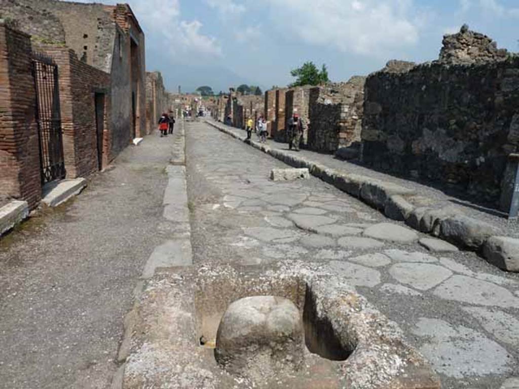 Via delle Scuole. May 2010. Looking north between VIII.2 and VIII.3.