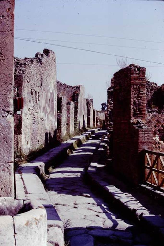 Vicolo Storto between VII.4 and VII.2, Pompeii. 1978. Looking north from junction with Via degli Augustali. Photo by Stanley A. Jashemski.
Source: The Wilhelmina and Stanley A. Jashemski archive in the University of Maryland Library, Special Collections (See collection page) and made available under the Creative Commons Attribution-Non Commercial License v.4. See Licence and use details. J78f0571