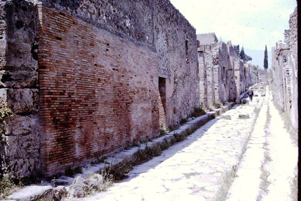 Vicolo dei Vettii, Pompeii, between VI.13 and VI.14. 1964. Looking north along west side. Photo by Stanley A. Jashemski.
Source: The Wilhelmina and Stanley A. Jashemski archive in the University of Maryland Library, Special Collections (See collection page) and made available under the Creative Commons Attribution-Non Commercial License v.4. See Licence and use details.
J64f1863