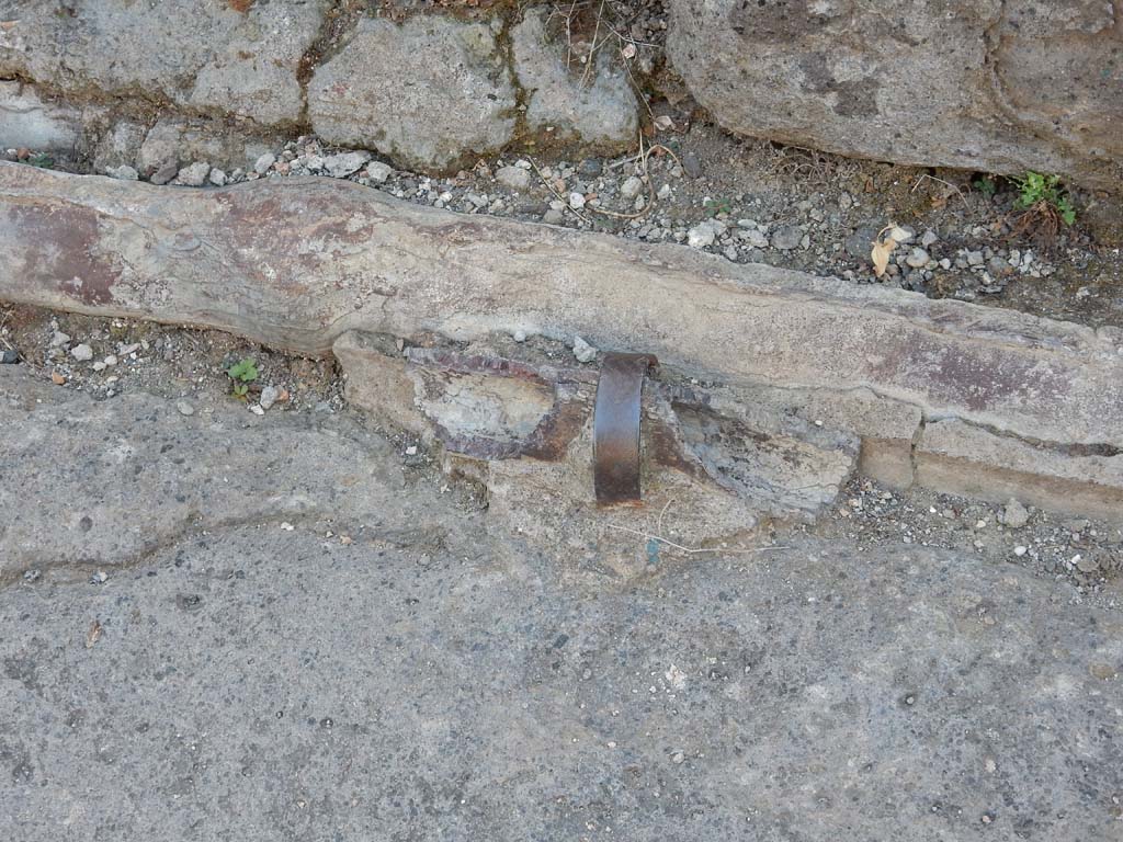 Vicolo dei Vettii, Pompeii, west side. June 2019. Detail of lead pipes in pavement outside VI.13.13.
Photo courtesy of Buzz Ferebee.