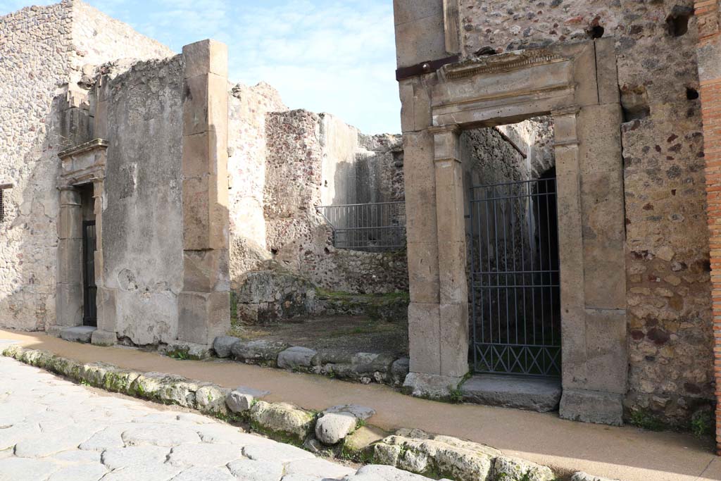 Vicolo del Lupanare, east side, Pompeii. December 2018.
Looking towards entrances at VII.1.48, on left, VII.1.49, in centre, with VII.1.50, on right. Photo courtesy of Aude Durand.