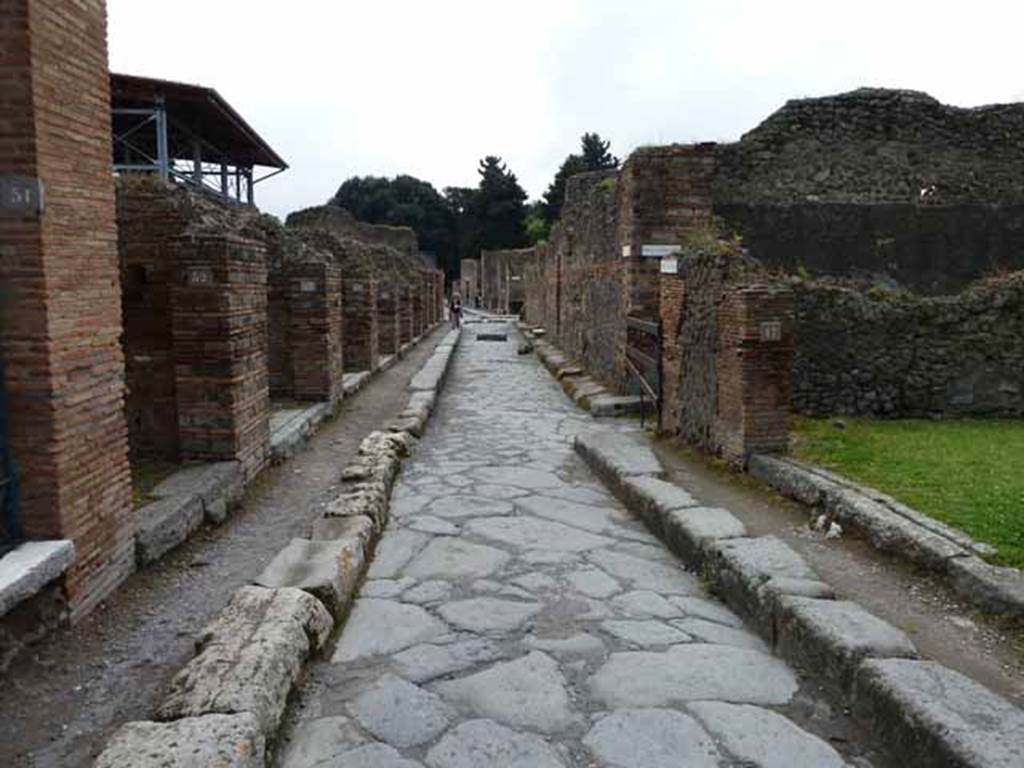 Vicolo del Lupanare, May 2010. Looking south between VII.1 and VII.11.