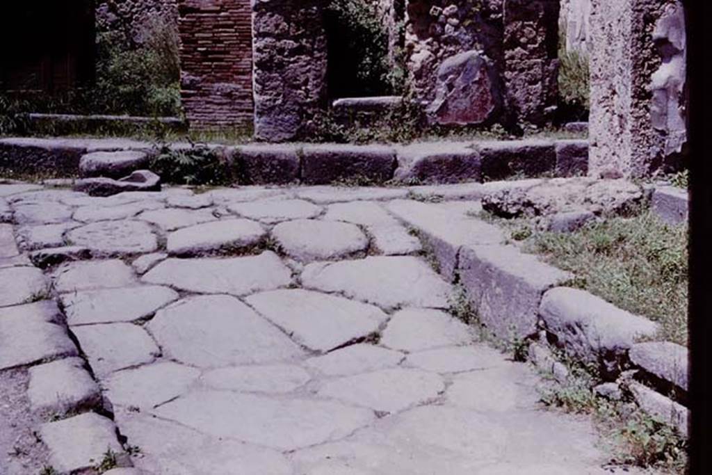Vicolo del Lupanare, Pompeii. 1964.  Looking north, at junction with Via degli Augustali. Photo by Stanley A. Jashemski.
Source: The Wilhelmina and Stanley A. Jashemski archive in the University of Maryland Library, Special Collections (See collection page) and made available under the Creative Commons Attribution-Non Commercial License v.4. See Licence and use details.
J64f1067
