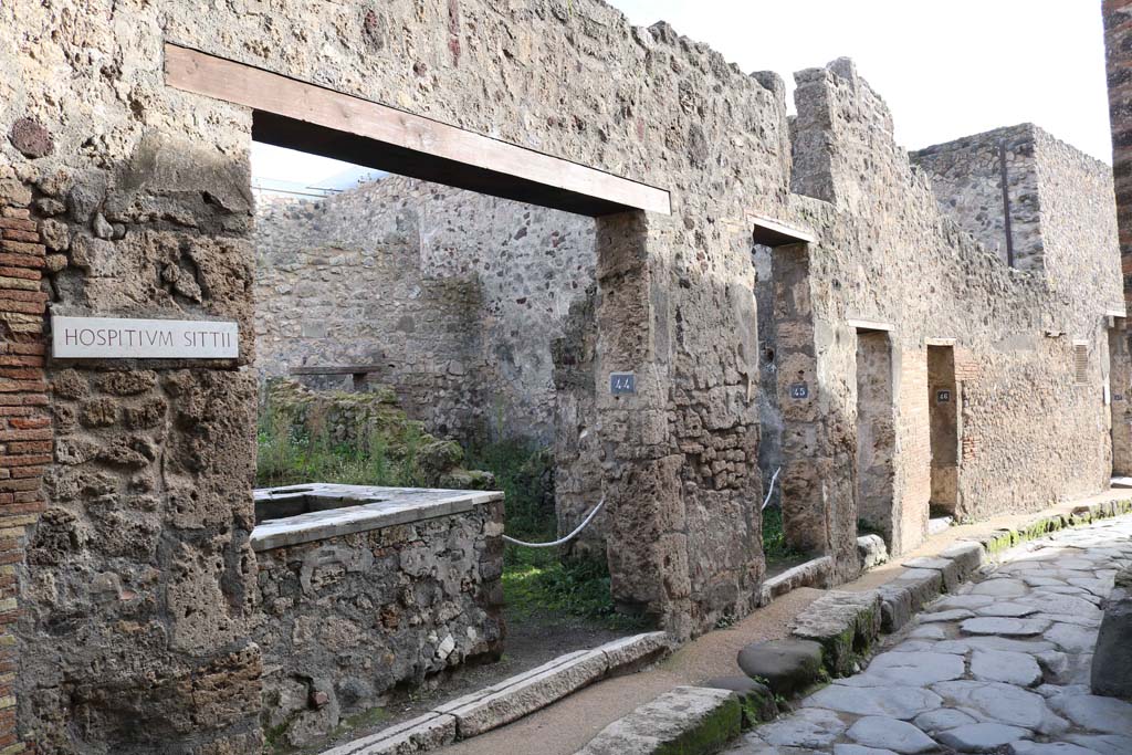 Vicolo del Lupanare, east side, Pompeii. December 2018. Looking south, from VII.1.44. Photo courtesy of Aude Durand.

