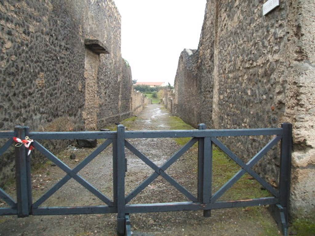 Vicolo della Nave Europa. July 2011. Looking north between I.22 and I.21. Photo courtesy of Rick Bauer.