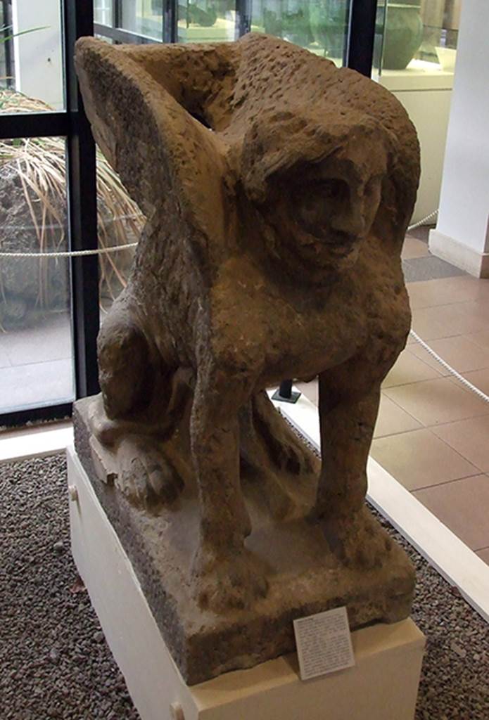 Villa 025. Boscoreale now Pompeii, Villa rustica nel Fondo di Antonio Prisco. Statue of a seated sphinx with feline body, female head and large wings. It would have originally been a funeral monument but by 79AD it had been placed, with another similar one (destroyed), at the entrance to the villa. Now in Boscoreale Antiquarium.