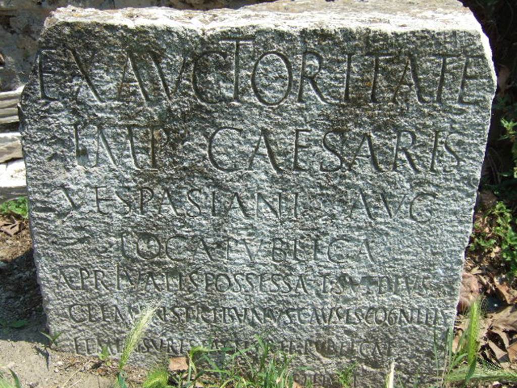 VGSC Pompeii Porta Vesuvio. May 2006. Cippus of Titus Suedius Clemens. 
The Cippus has a latin inscription reading -
Ex auctoritate 
imp(eratoris) Caesaris 
Vespasiani Aug(usti)
loca publica,
a privatis possessa T(itus) Suedius 
Clemens tribunus causis cognitis 
Et mensuris factis rei publicae
Pompeianorum restituit  
This translates as -
By virtue of authority conferred upon him by the Emperor Vespasian Caesar Augustus, 
Titus Suedius Clemens, tribune, having investigated the facts and taken measurements,
restored to the citizens of Pompeii public places illegally appropriated by private persons.
Similar Cippi were found at the Porta Ercolano, Porta Marina and the Porta Nocera.  The wording �rei publicae Pompeianorum� on one of these, discovered in 1763, was the first positive identification that the site was Pompeii.  Until then scholars had divided opinions on the city buried under Civita.  Many, including the first official excavators, thought it was the ancient city of Stabiae. See Conticello, B., Ed, 1990. Rediscovering Pompeii. Rome: L�Erma di Bretschneider. (p. 225).


