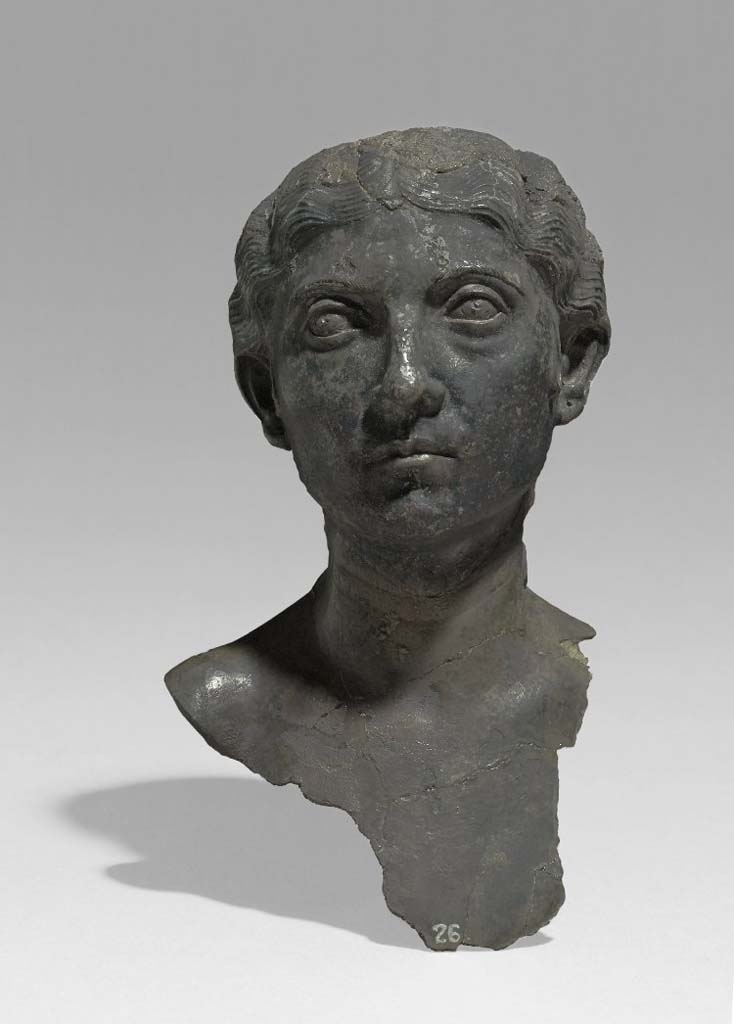Villa della Pisanella, Boscoreale. The emblema (decorative centre-piece) of a silver dish: bust of a woman, inscribed: "Maxima's". 
The dish was one of a pair, the other representing an elderly man.
According to De Villefosse, this phiale had a pendant of the same shape and the same dimension, decorated with a woman's head. Violently torn, in antiquity, from the washer which formed the bottom of the emblema, as evidenced by the tears in the silver leaf at its base, this head was collected separately in another part of the house and sold before the arrival of the treasure in Paris. After belonging to Count Michel Tyszkiewicz, it entered the collections of the British Museum; the phiale was not found. This female head has exactly the same shape and dimensions as the male head.

L'embl�me (pi�ce centrale d�corative) d'un plat d'argent: buste d'une femme, inscrit: "Maxima's".
Le plat �tait l'un d'une paire, l'autre repr�sentant un homme �g�.
Selon De Villefosse, cette phiale avait un pendant de m�me forme et de m�me dimension, orn� d'une t�te de femme. Violemment arrach�e, dans l'antiquit�, de la rondelle qui constituait le fond de l'emblema, ainsi que l'attestent les d�chirures de la feuille d'argent � sa base, cette t�te a �t� recueillie s�par�ment dans une autre partie de l'habitation et mise dans le commerce avant l'arriv�e du tr�sor � Paris. Apr�s avoir appartenu au comte Michel Tyszkiewicz, elle est entr�e dans les collections du Mus�e britannique; la phiale n'a pas �t� retrouv�e. Cette t�te de femme a exactement la m�me forme et les m�mes dimensions que la t�te d'homme.

Voir/See De Villefosse H., 1899. L'argenterie et bijoux d'or du tr�sor de Boscoreale description des pi�ces conserv�es au Mus�e du Louvre: Monuments et Memories 5 1899 with supplement 1902, p. 45-6, figs. 8-9.

Photo � Trustees of the British Museum. Inventory number BM 1895,0622.1. Use subject to CC BY-NC-SA 4.0.
