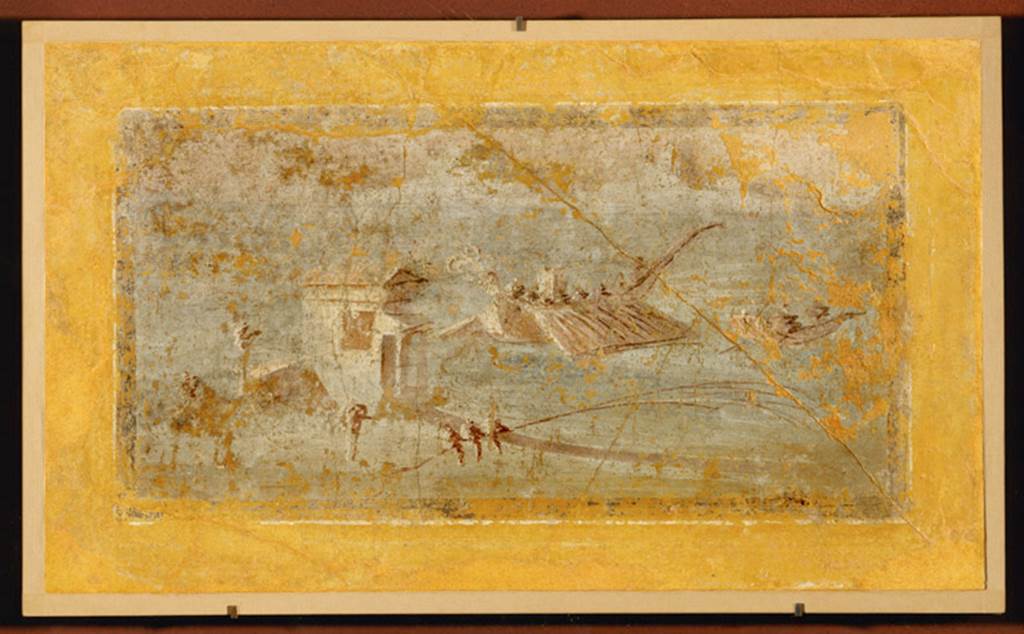 Villa rustica del fondo Ippolito Zurlo, Pompeii. 2005. Room B triclinium. East wall left yellow panel.
Painting of fishing with the net: three sailors are busy pulling the net while in the sea you could see two boats with oars.
Size 0.32m high and 0.61m wide.
Now in the Louvre. Inventory number P25.
Photo © RMN-Grand Palais (musée du Louvre) / Erich Lessing.
See Paysage Maritime on rmn.fr