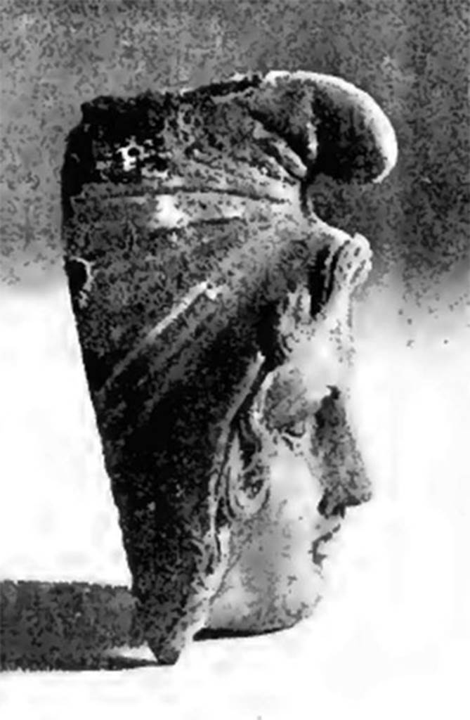 Villa of T. Siminius Stephanus, fondo Barbatelli. November 1899. Side view of the bronze bust of Paris wearing a Phrygian cap. See Notizie degli Scavi di Antichit�, 1899, p439, fig 1a.