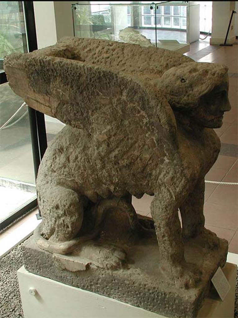 Boscoreale now Pompeii, Villa rustica nel Fondo di Antonio Prisco.
Statue of a seated sphinx with feline body, female head and large wings.
The statue was found out of its original funerary context so we cannot be certain that it was attributable to this tomb “D”.
Now in Boscoreale Antiquarium. SAP inventory number 25896.