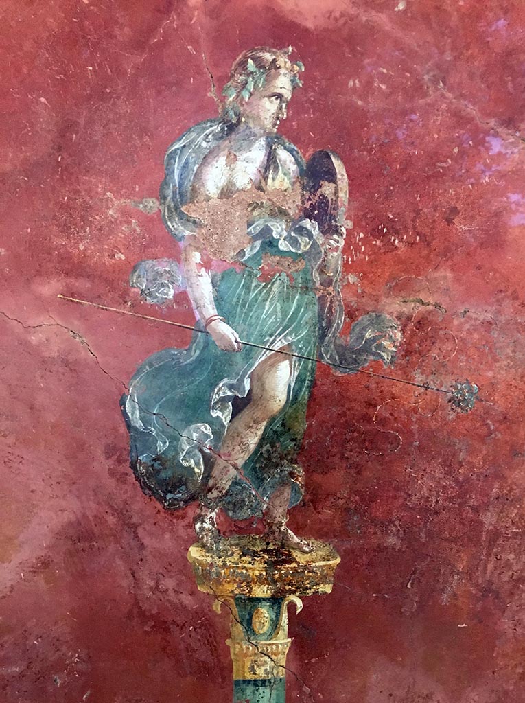 Complesso dei triclini in località Moregine a Pompei. September 2015.
Triclinium C, east wall on display in Pompeii Palaestra.
Figure dressed in green, possibly Polyhymnia the muse of hymns and sacred poetry, or perhaps a maenad with bacchic attributes.
