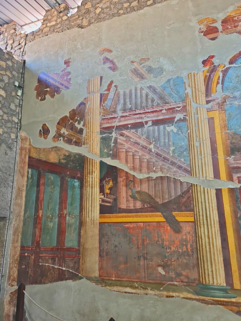 Oplontis Villa of Poppea, October 2023.
Room 15, detail of painted decoration at side of doorway at north end of east wall.
Photo courtesy of Giuseppe Ciaramella.