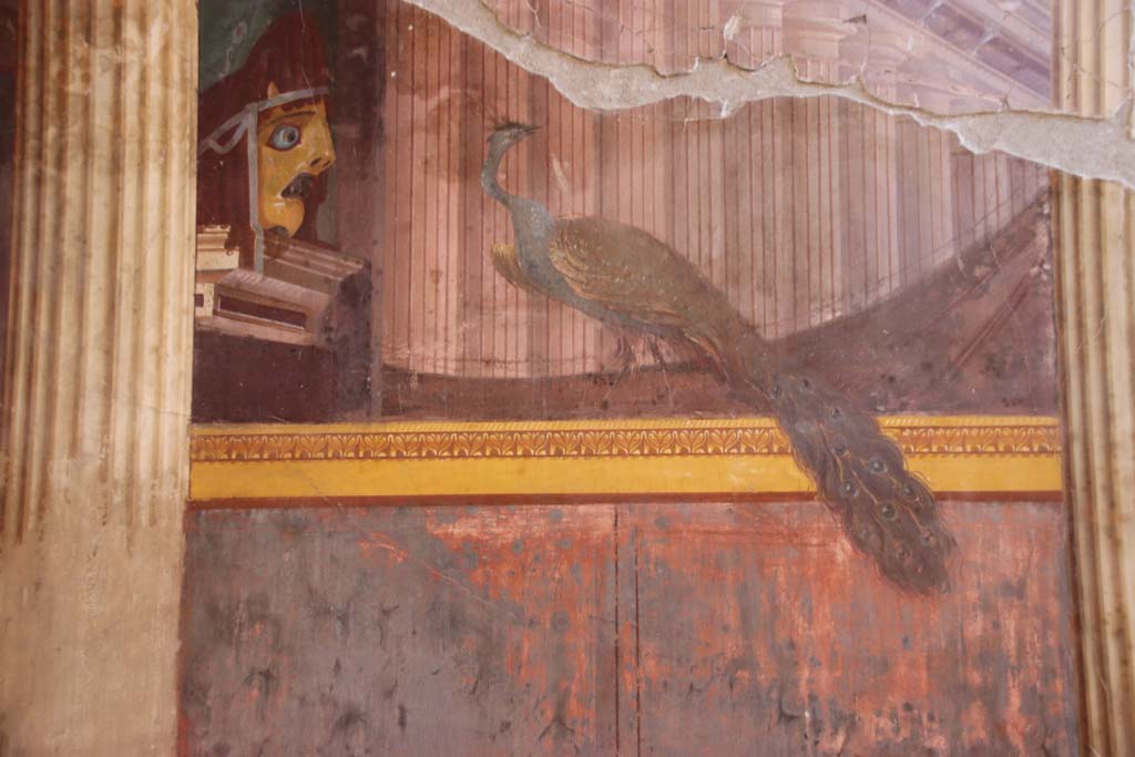 Oplontis Villa of Poppea, September 2021.
Room 15, detail of tragic mask and peacock, from north end of east wall. Photo courtesy of Klaus Heese.