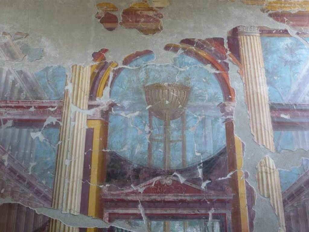 Oplontis, May 2011. Room 15, east wall, detail of painting of the Delphic tripod.
Photo courtesy of Buzz Ferebee.