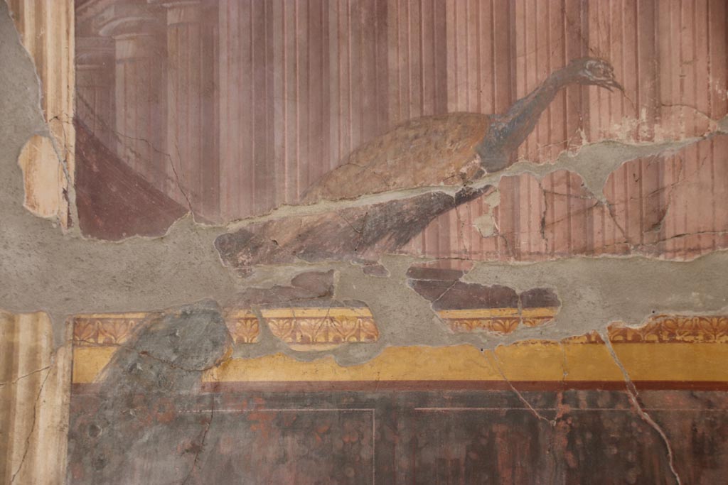 Oplontis Villa of Poppea, October 2022. Room 15, detail of painted peacock, from south end of east wall. Photo courtesy of Klaus Heese.