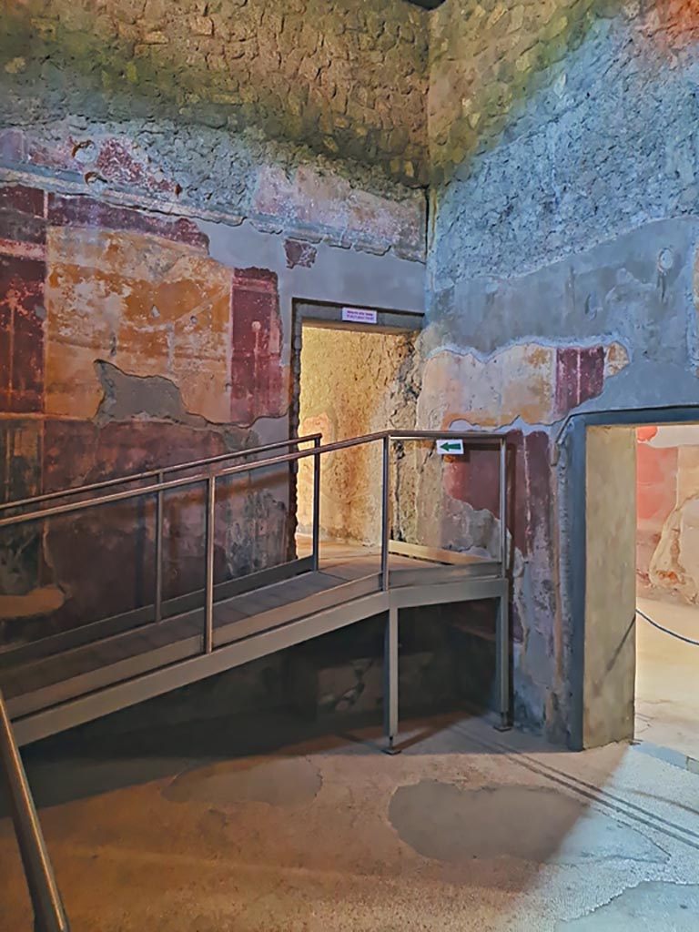 Oplontis Villa of Poppea, October 2023.
Room 18, looking towards east wall and south-east corner with doorway to room 17, in centre, and room 8, on right.
Photo courtesy of Giuseppe Ciaramella.