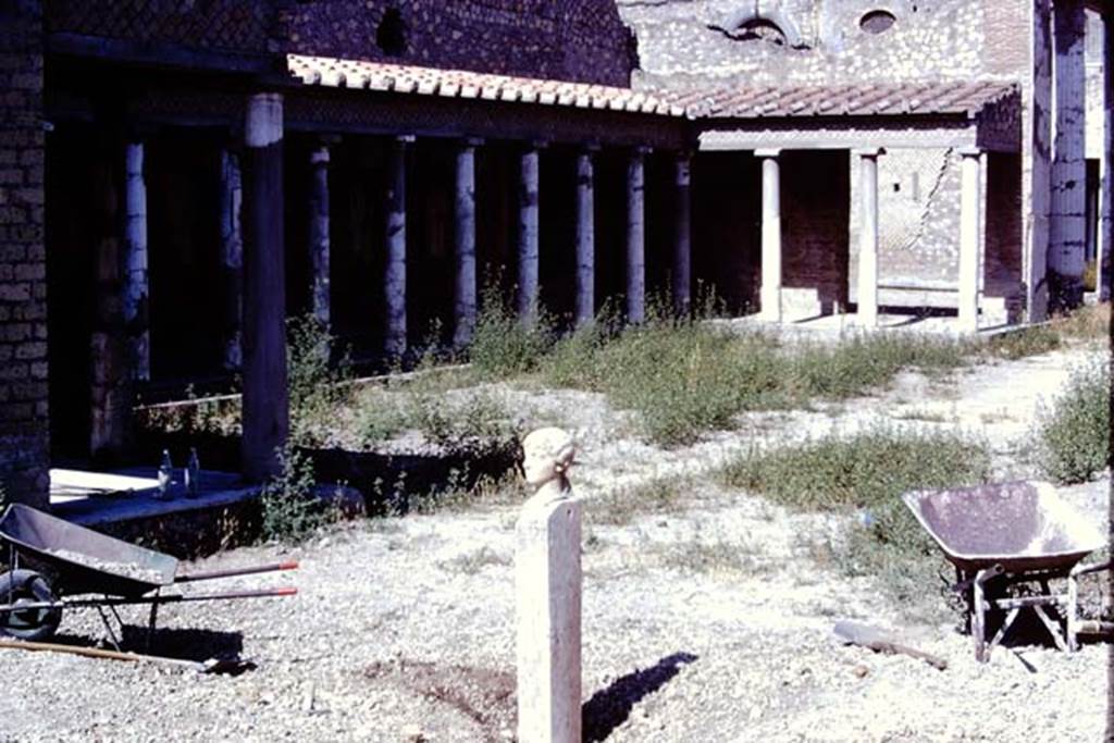 Oplontis, 1975. Looking south-west across north garden, near east portico 34, where the head and shaft were discovered. Photo by Stanley A. Jashemski.
Source: The Wilhelmina and Stanley A. Jashemski archive in the University of Maryland Library, Special Collections (See collection page) and made available under the Creative Commons Attribution-Non Commercial License v.4. See Licence and use details. J74f0909