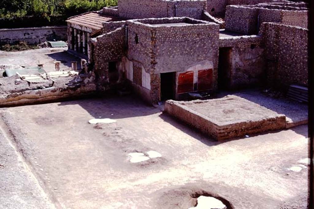 Oplontis, 1975. Area 56, looking south-west across north garden towards the painted plaster on exterior walls of room 55, towards the south-east peristyle (no.59).
Area 58, can be seen, on right. Photo by Stanley A. Jashemski.
Source: The Wilhelmina and Stanley A. Jashemski archive in the University of Maryland Library, Special Collections (See collection page) and made available under the Creative Commons Attribution-Non Commercial License v.4. See Licence and use details. J75f0533