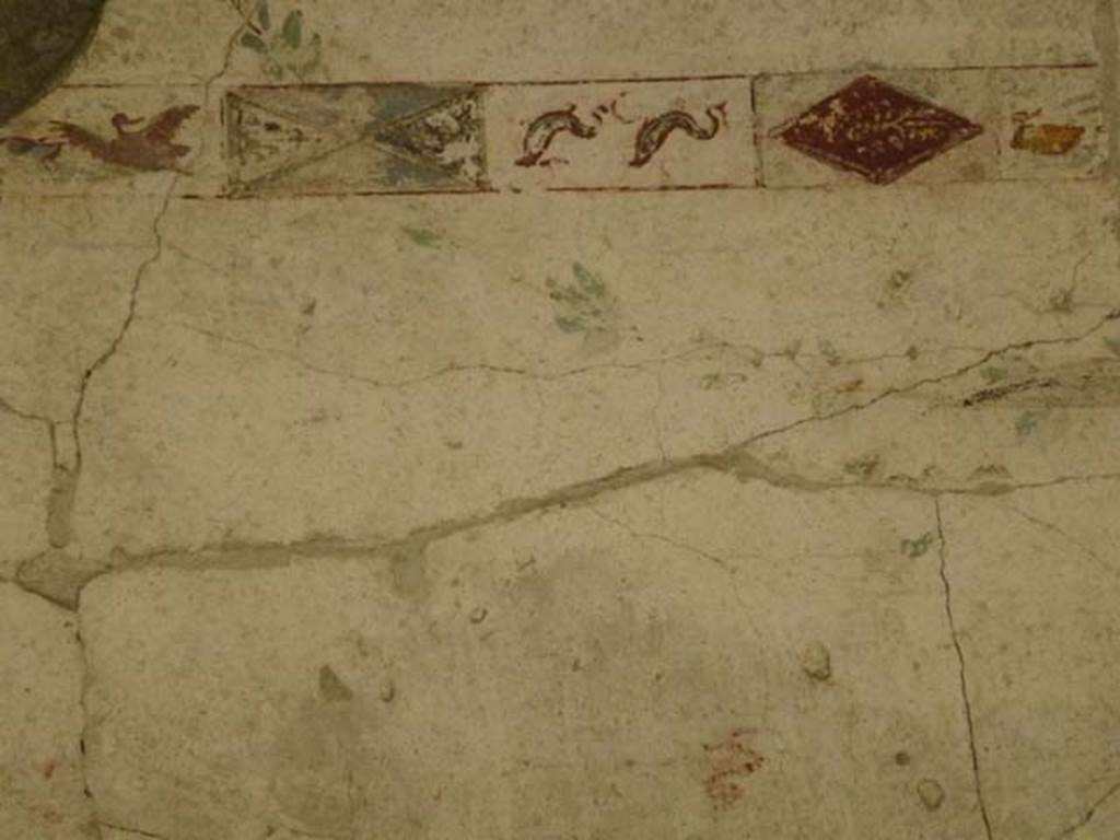 Oplontis, September 2011. Area 60, west portico. Decorative border at top of wall to right of entrance to corridor 46. 
Photo courtesy of Michael Binns.
