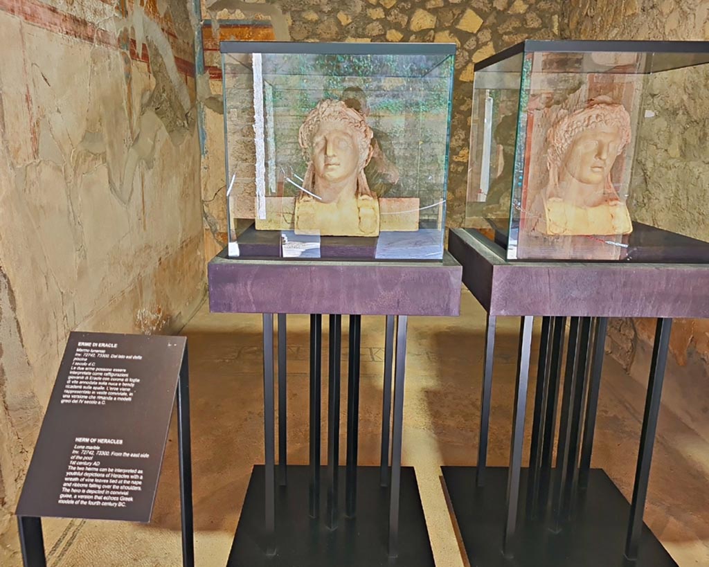 Oplontis Villa of Poppea, October 2023.
Area 92/96, two marble herms of Hercules found on east side of the pool, on display here in Room 25.
Photo courtesy of Giuseppe Ciaramella.