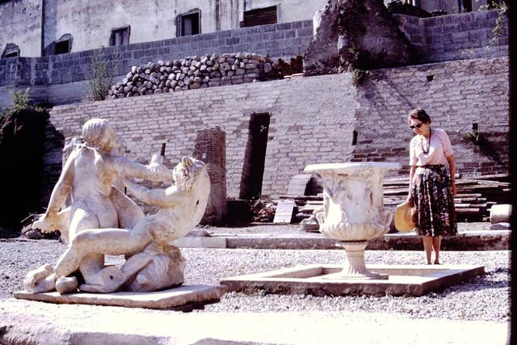 Oplontis, 1978. Area 92, Wilhelmina studying the items on the south side of pool. Photo by Stanley A. Jashemski.
Source: The Wilhelmina and Stanley A. Jashemski archive in the University of Maryland Library, Special Collections (See collection page) and made available under the Creative Commons Attribution-Non Commercial License v.4. See Licence and use details. J78f0051