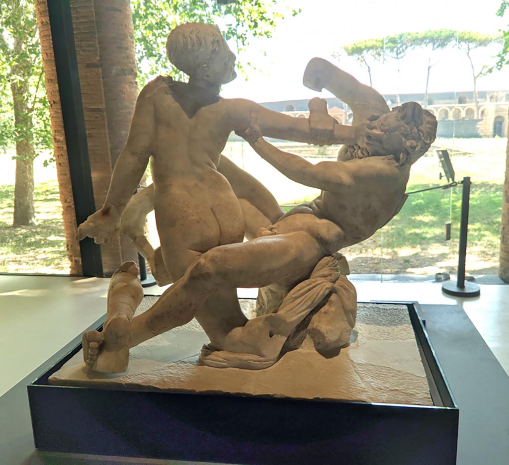 Oplontis Villa of Poppea, April 2022.
Statuette of hermaphrodite and a faun, on display at II.7.9, the Palaestra in Pompeii.
Photo courtesy of Giuseppe Ciaramella.