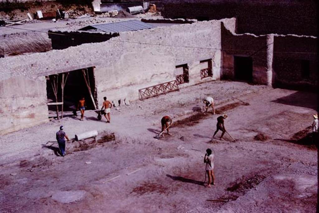Oplontis, 1977. Looking south-east across east end of north garden. In this photo, the edge of the portico along the garden�s east side is being seached for root-cavities.  Photo by Stanley A. Jashemski.   
Source: The Wilhelmina and Stanley A. Jashemski archive in the University of Maryland Library, Special Collections (See collection page) and made available under the Creative Commons Attribution-Non Commercial License v.4. See Licence and use details. J77f0232
