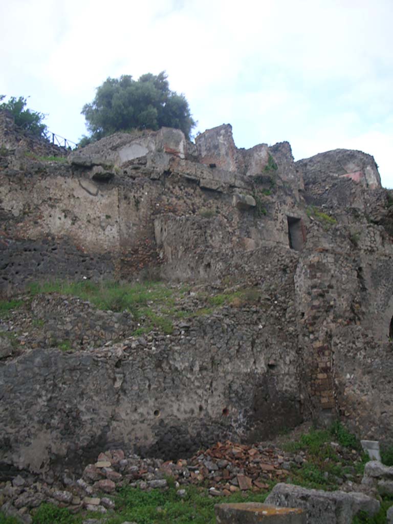 VIII.2.A, on left, VIII.2.1, on right, Pompeii. May 2010.
Looking north towards detail of wall separating properties. Photo courtesy of Ivo van der Graaff.