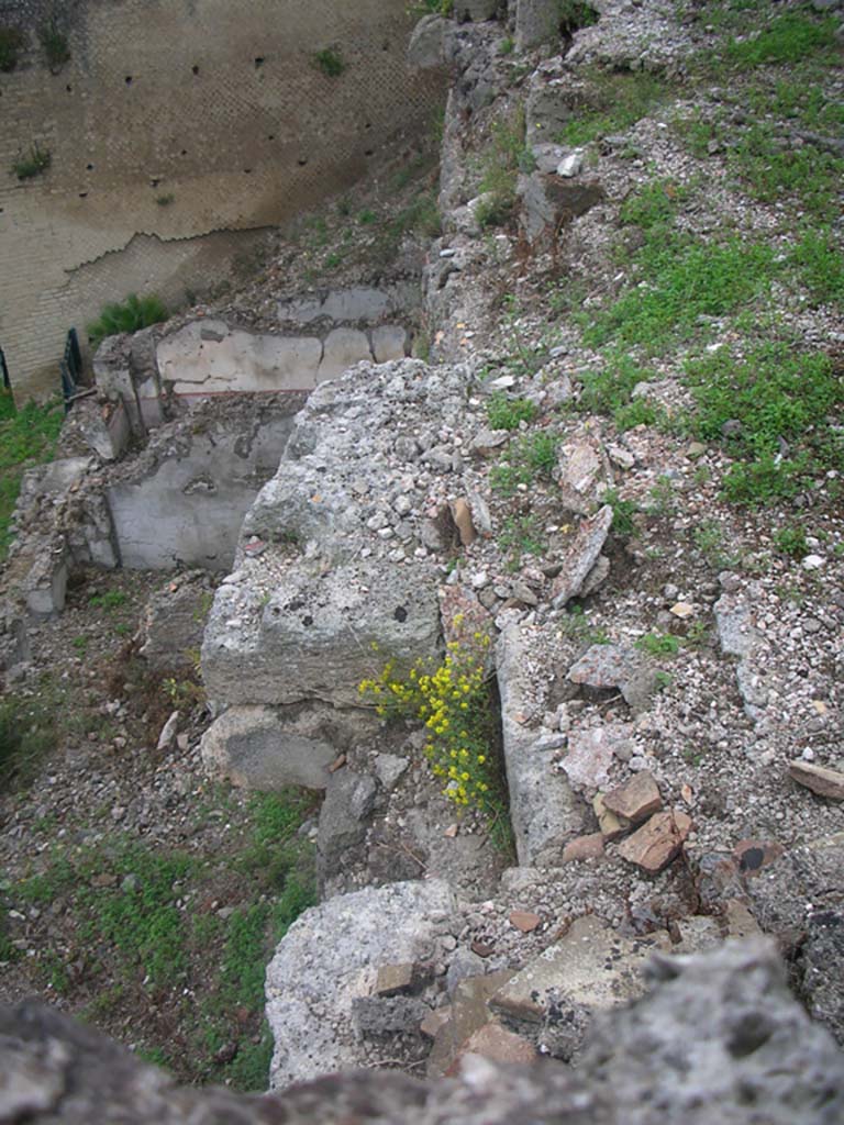 VIII.2.A Pompeii. May 2010.
Looking west with detail of decorated wall in lower room. Photo courtesy of Ivo van der Graaff.