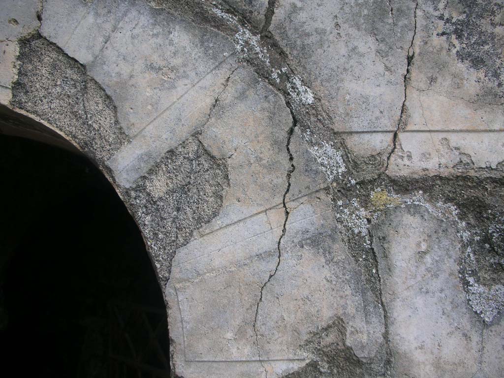Tower VI, Pompeii. May 2010.
Detail of remaining stucco on upper east doorway. Photo courtesy of Ivo van der Graaff.