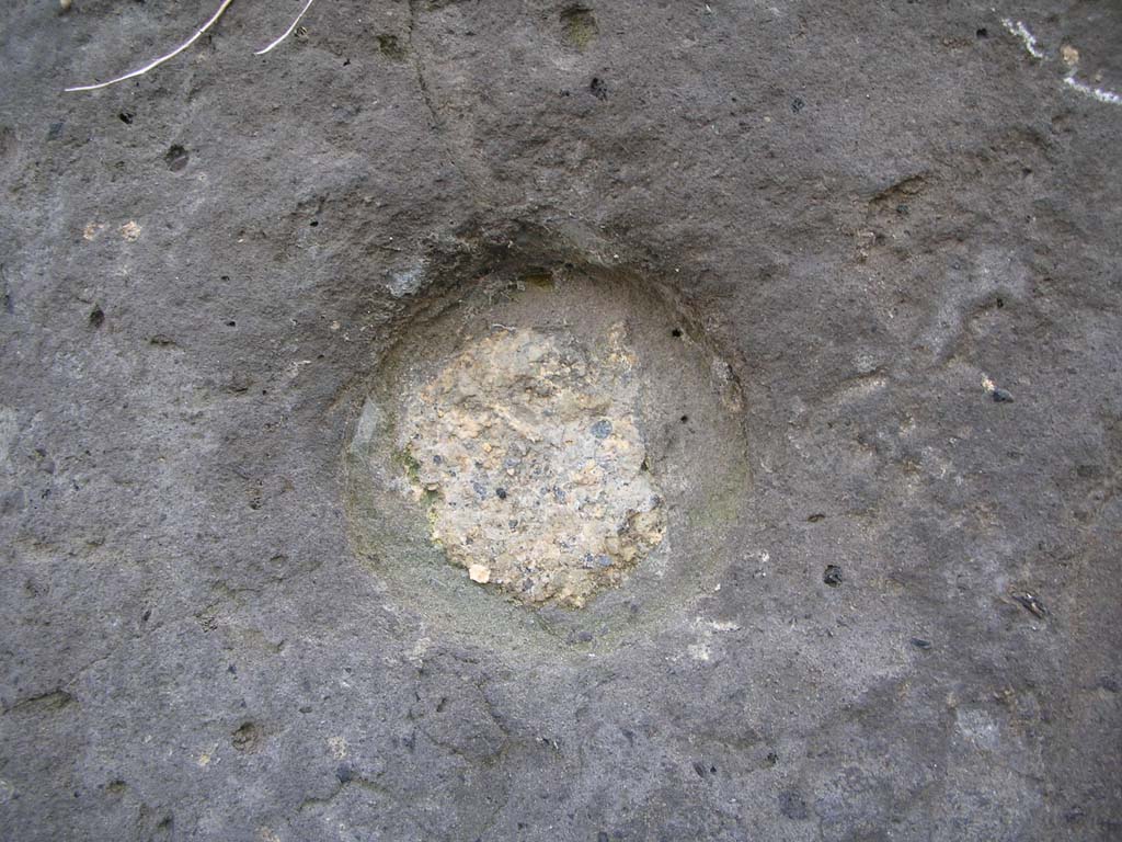 Vesuvian Gate, Pompeii. May 2010.
Detail of missile indentation from war machines of Sulla, on west side of Gate at north end. Photo courtesy of Ivo van der Graaff.